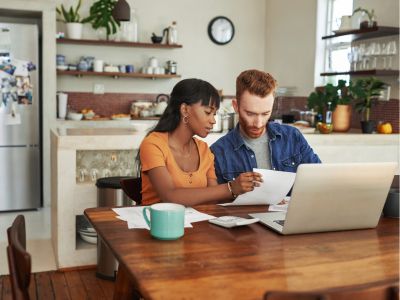 couple checking roofer contractor references